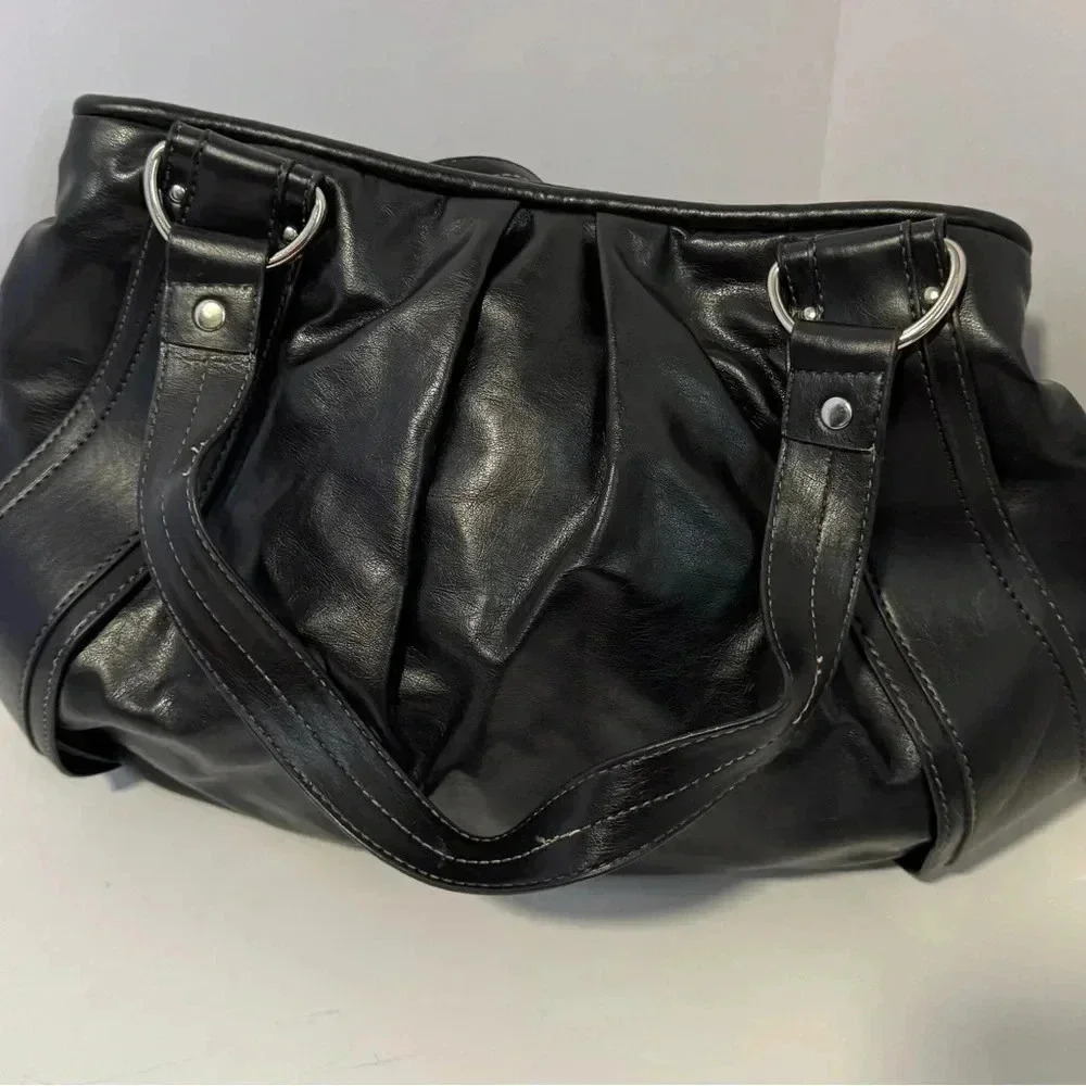 Nine  and Co  black leathe purse